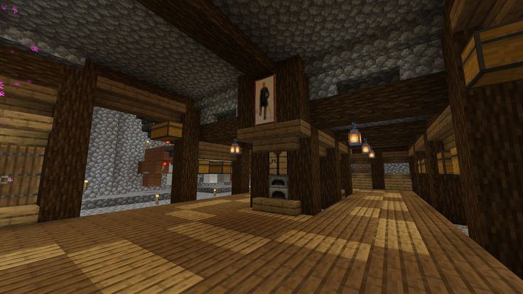 an empty room with wooden floors and walls in minecraft, showing the entrance to another room