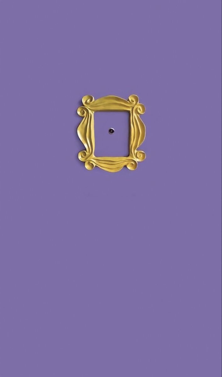 a gold frame on a purple background