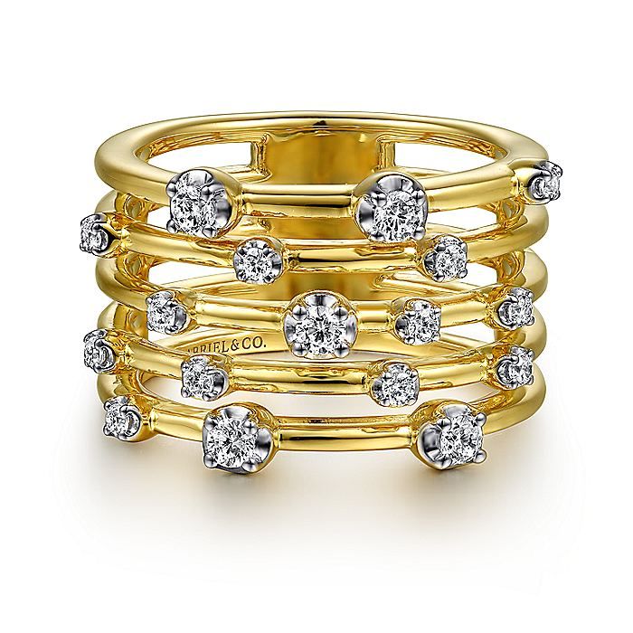 Like a coordinated ring stack in one effortless piece, this five row wide band ring is a glamorous modern accessory. The 14K yellow gold shank is polished to a gleaming finish and dotted with radiant round diamond stations in varying sizes. With 0.38cts of diamonds in all, this contemporary ring makes a sparkling statement. Wide Diamond Rings, Ladies Rings, Criss Cross Ring, Colored Stone Rings, Split Shank Ring, Wide Band Ring, Classic Wedding Band, Pave Diamond Ring, Contemporary Ring