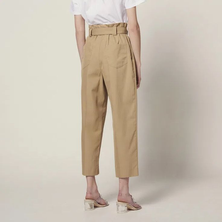 Sandro Women’s Pants Belted High-Waisted Pants 100% Cotton Loose Fit Topstitching On The Waistband Sandro Logo Engraved On The Buckle Of The Belt Pleats At The Waist Two Slanted Pockets On The Front And Two Patch Pockets On The Back Model Is Wearing A Size 36/Uk 8/Us 26 Inseam Lenght: 37.5" Inseam Lenght: 25" Reference : P6517e Main Fabric: 100% Cotton Buckle: 100% Zamac Belt Lining: 100% Cotton Pocket Lining: 100% Cotton Belted Beige Trousers, Belted High-waisted Pants For Spring, Spring High-waisted Belted Pants, Belted Cotton Wide Leg Pants, High Waist Cotton Pants With Belt, Belted Tapered Leg Summer Bottoms, Summer Tapered Leg Belted Bottoms, Summer Belted Tapered Leg Bottoms, Tailored Beige Pants With Belt Loops