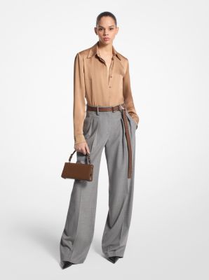 These wide-leg trousers combine timeless tailoring elements, like front pleats and crisp leg creases, with stretch-infused virgin wool sourced from an Italian mill. A high-rise fit evokes a strong feminine aesthetic. Balance its soft hand and languid drape with pointed-toe heels. Made in Italy. Luxury Wide Leg Pants For Business Casual, Luxury Wide Leg Dress Pants For Work, Luxury Tailored Wide Leg Pants For Business Casual, Luxury Wide Leg Pants With Belt Loops For Work, Luxury Tailored Wide Leg Pants For Workwear, Luxury Wool Wide Leg Pants, Tailored Wide Leg Pants For Formal Fall Occasions, Luxury Tailored Wide Leg Pants For Office, Fall Wide Leg Pants With Pressed Crease For Work