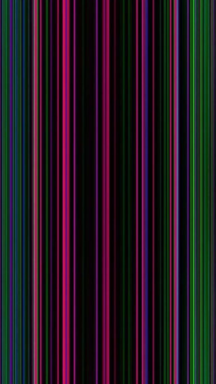 an image of colorful lines in the dark