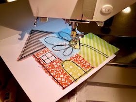 a close up of a sewing machine with fabric on it