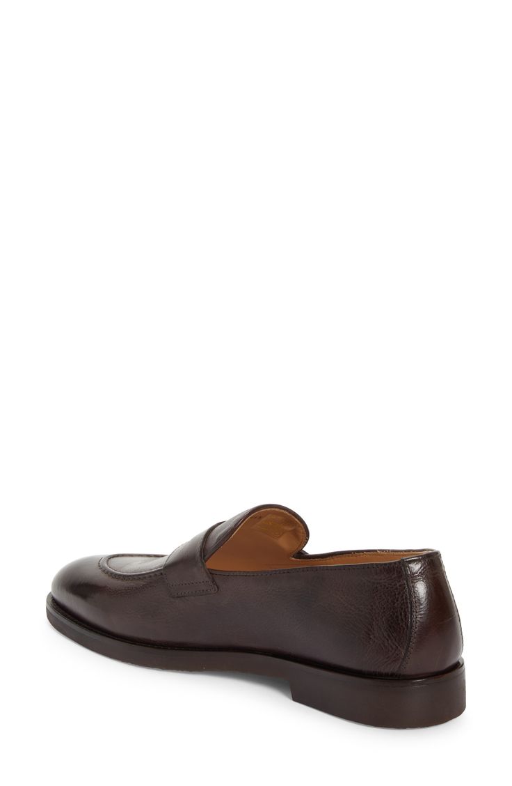 A polished apron-toe penny loafer is crafted in Italy from smooth and supple calfskin leather and given a traction boost with a textured rubber sole. Leather upper and lining/rubber sole Made in Italy Designer Shoes Timeless Moc Toe Loafers, Goodyear Welted Cap Toe Loafers For Work, Semi-formal Goodyear Welted Calf Leather Loafers, Leather Tassel Loafers With Goodyear Welt For Work, Calf Leather Cap Toe Loafers For Business Casual, Elegant Tassel Loafers With Goodyear Welt For Business, Elegant Business Tassel Loafers With Goodyear Welt, Goodyear Welted Slip-on Dress Shoes In Calf Leather, Elegant Business Moccasins With Goodyear Welt Construction