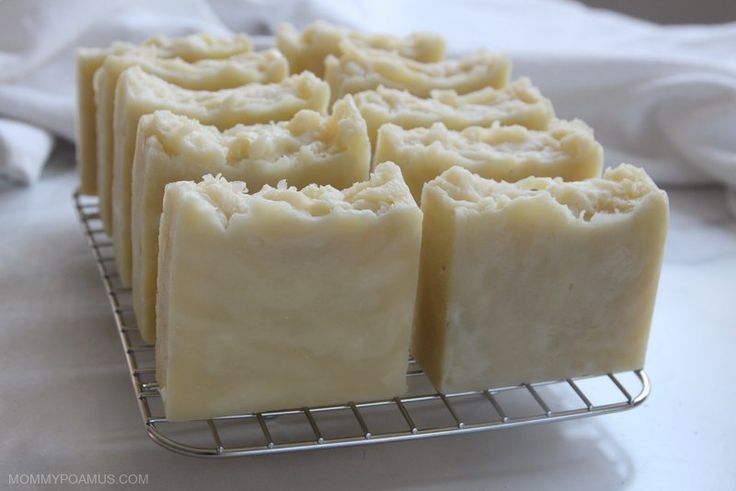 several pieces of soap sitting on a cooling rack