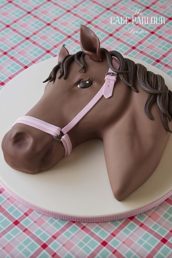 a cake shaped like a horse on top of a table