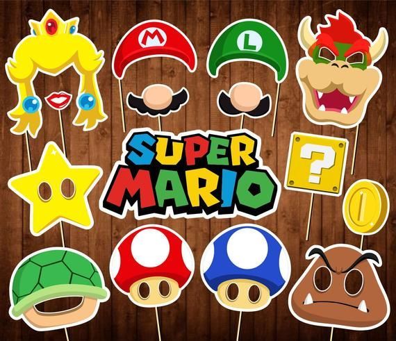 super mario party photo booth props on a wooden background with the words super mario written in large letters