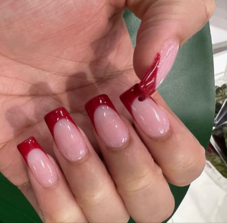 red french tip acrylic nails. #frenchtipnails #red #acrylic Red Tip Square Acrylic Nails, Red Shirt French Tip, Red French Tips Short, Red Square Nails French Tip, Square Acrylic Nails Red French Tips, French Nails With Red Design, Red Tip Square Nails, Acrylic Nails Red Square, Ted French Tips