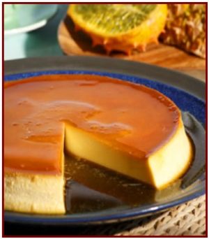 a cheesecake on a blue plate with some fruit in the background and one slice missing