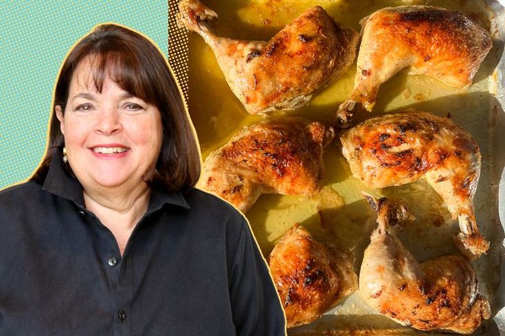 a woman standing in front of some chicken on a baking sheet and an oven mitt