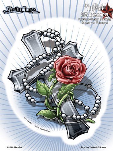 a cross with a rose on it and pearls around the edges is featured in an ebay ad