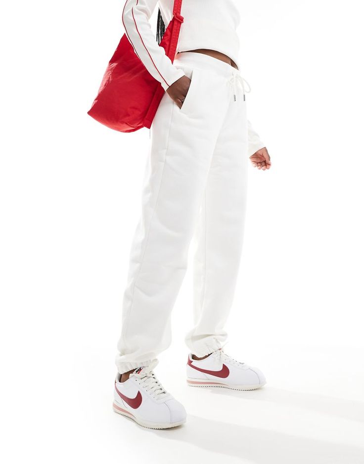 Sweatpants by Jordan For 'no plans' plans Elasticated drawstring waist Side pockets Logo patch Elastic cuffs Regular, tapered fit White Casual Sweatpants With Drawstring, White Casual Joggers With Side Pockets, White Casual Drawstring Sweatpants, Casual White Joggers With Ribbed Cuffs, Casual White Joggers With Drawstring, White Athleisure Joggers With Drawstring, White Drawstring Joggers For Jogging, White Bottoms With Ribbed Cuffs For Streetwear, White Drawstring Sweatpants