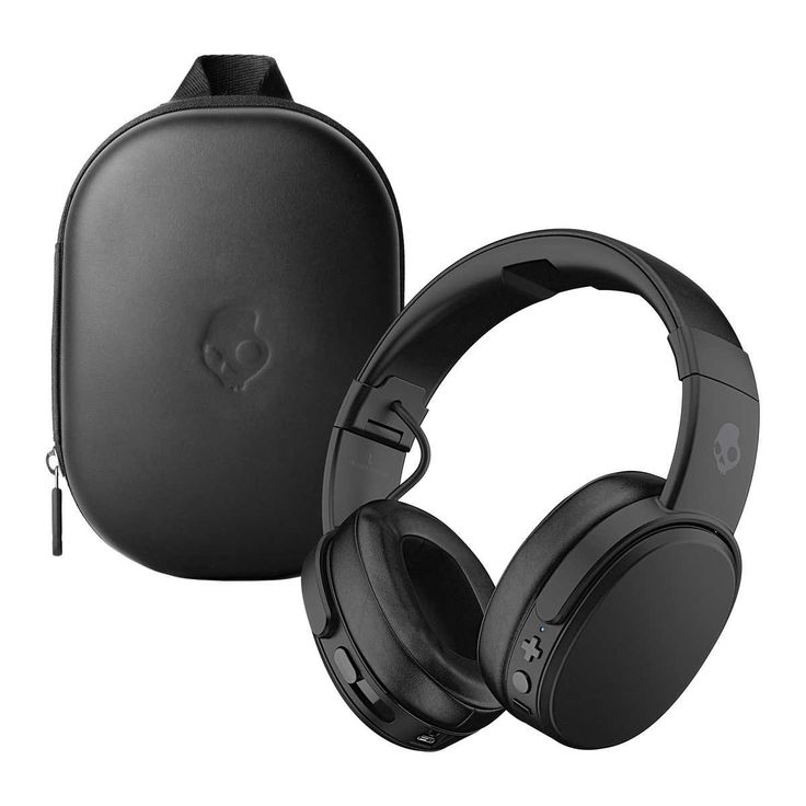 the skull headphones are next to an empty case