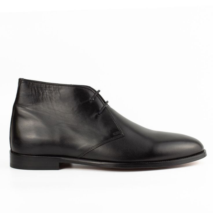 Up your shoe game with our versatile style Breeze Black Leather Boots, a definitive choice for Men's Leather Chukka Boots. Crafted with meticulous attention to detail, these boots seamlessly blend classic design and premium materials for an unmatched look. Step confidently into the world of timeless fashion as you shop now for these exceptional chukka boots, embracing the fusion of traditional charm and modern sophistication. Own a pair of Breeze Black Leather Boots that seamlessly enhance your Formal Calf Leather Ankle Lace-up Boots, Wingtip Boots With Stitched Sole For Derby, Leather Chelsea Boots With Brogue Detailing For Business, Business Leather Chelsea Boots With Brogue Detailing, Classic Lace-up Boots With Leather Lining And Round Toe, Classic Lace-up Boots With Round Toe And Leather Lining, Classic Black Lace-up Boots For Work, Semi-formal Calf Leather Boots With Round Toe, Classic Formal Lace-up Ankle Boots