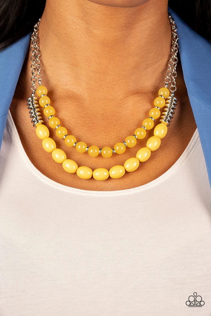 Infused with silver accents, rows of glassy and acrylic Illuminating beads are threaded along invisible wires at the bottom of two silver chains that layer into a sunny pop of color below the collar. Features an adjustable clasp closure.   Sold as one individual necklace. Includes one pair of matching earrings.  
 Get The Complete Look! 
Bracelet: "La Vida Vacation - Yellow" (Sold Separately) Yellow Necklace, Mixed Metal Jewelry, Silver Chains, Paparazzi Accessories, Paparazzi Jewelry, How To Show Love, Silver Accents, Acrylic Beads, Earring Necklace