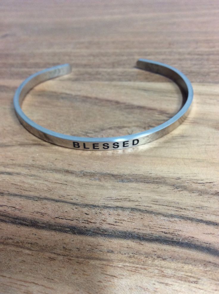 "\"Blessed\" bangle bracelet Silver color. Stainless steel Stamped message These bracelets are fun to wear and look great stacked in different colors and different quotes. Adjustable." Steel Stamp, Flower Molding, Pretty Beads, Different Quotes, Silver Bangle Bracelets, Bracelet Silver, Bangle Bracelet, Different Colors, Silver Color