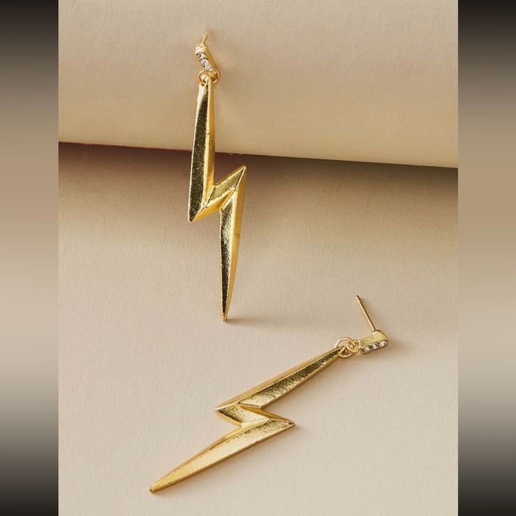 This Unique Pair Is A Wonderful Addition To Your Wardrobe And Your Style; Sure To Get Lots Of Compliments! Gshmj100m00m8ln Earrings Shein, All That Glitters Is Gold, Gold Drop Earrings, Lightning Bolt, Stylish Jewelry, Earrings Color, Metallic Colors, Gold Material, Arrow Necklace