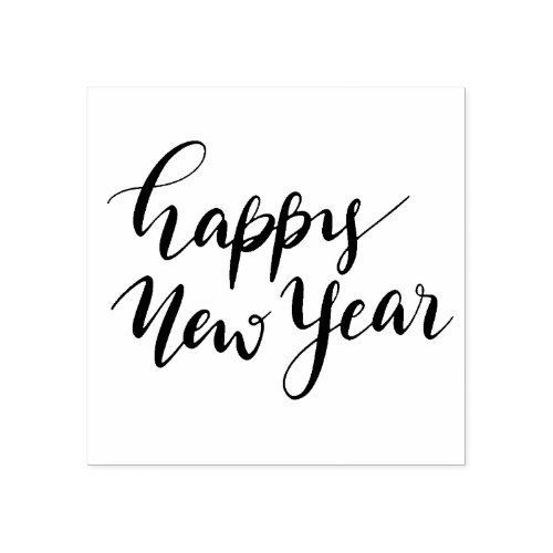 the words happy new year written in black ink on a white background with an inscription below it