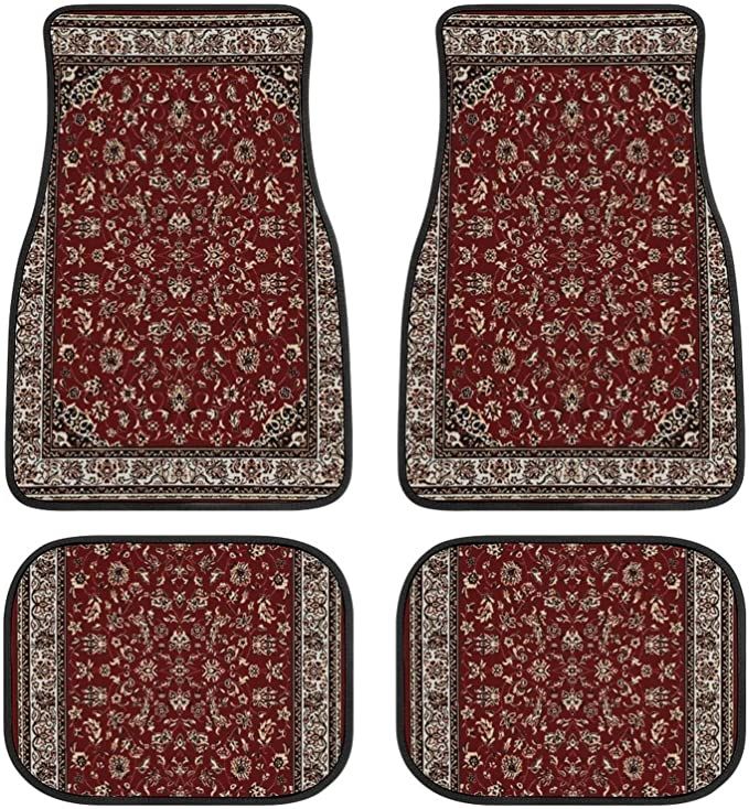 four red carpeted floor mats with floral designs