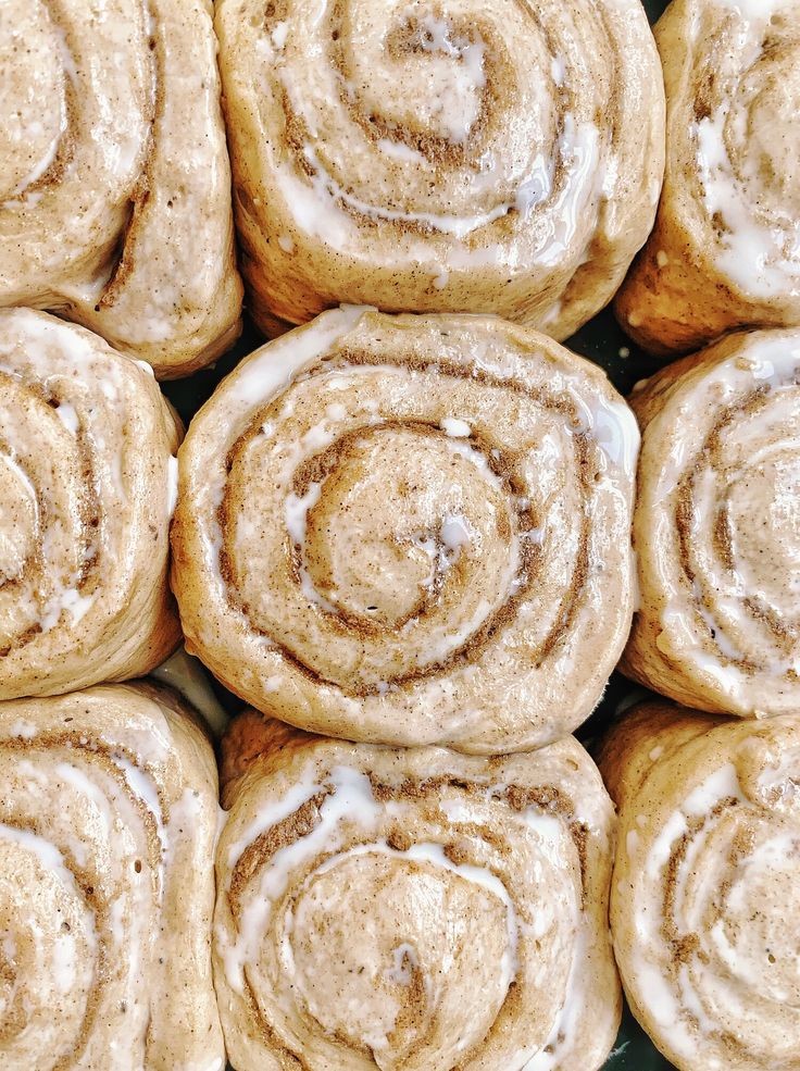 several cinnamon rolls sitting on top of each other