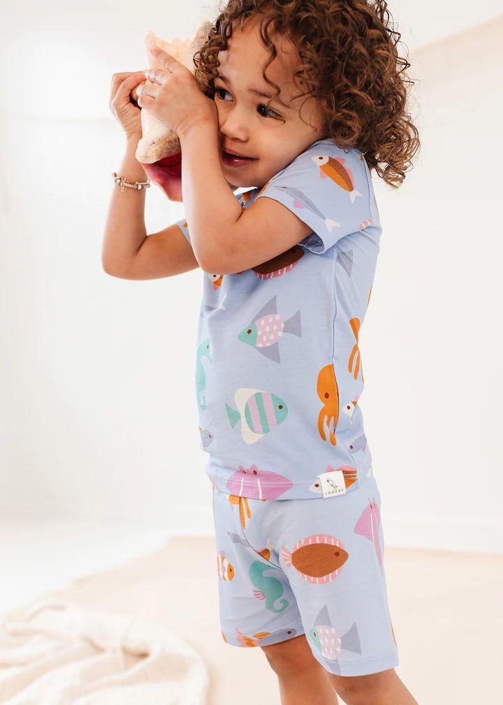 Be silly and never grow up. Are you tired of pajamas that feel more like a thing of the past? Our Under the Sea Pajamas are here to save the day! They’re made with luxuriously cozy bamboo fabric and feature exclusive designs so your babes can stay comfy all year round. Let your little ones join their fellow fishies in Watermelon Crush, Window Writing, Animal Pajamas, Navigation Design, Be Silly, Cozy Pajamas, Never Grow Up, Rubber Ducky, Save The Day