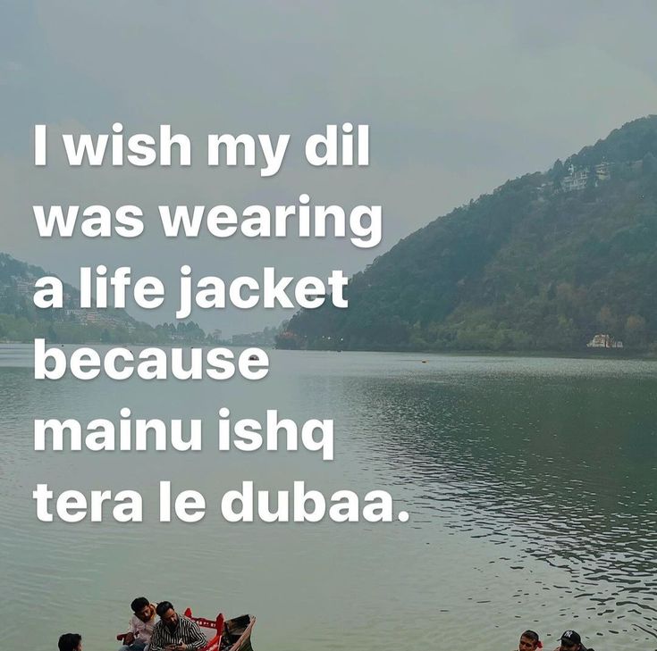 some people are sitting on the shore of a lake with mountains in the background and a quote written above them