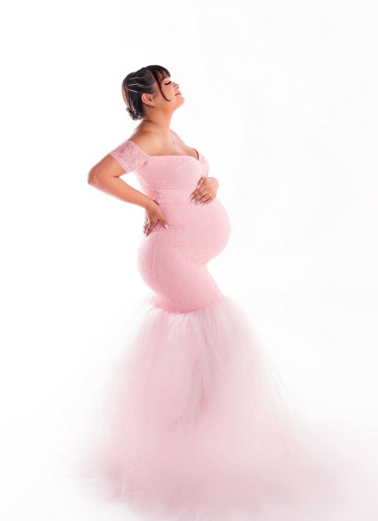 Off the Shoulder Lace Sweetheart Tulle Gown in Blush Pink. Our Off-the-Shoulder Lace Sweetheart Tulle Gown is pure dreaminess! It’s a princess style maternity gown constructed of premium stretch material on the bodice, a stretch lace overlay and a handcrafted tulle bottom. Step into this formal maternity gown and feel like royalty. #SexyMamaMaternity #ShopSexyMama #princessmaternitygown #tullematernitygown Maternity Fitted Gown With Tulle Skirt, Fitted Maternity Gown With Tulle Skirt, Fitted Maternity Dress With Lace Bodice, Maternity Fitted Gown With Sweetheart Neckline, Fitted Floor-length Tulle Maternity Dress, Luxury Romantic Floor-length Maternity Dress, Elegant Pink Tulle Maternity Dress, Maternity Gowns Formal, Pink Off-shoulder Maternity Dress