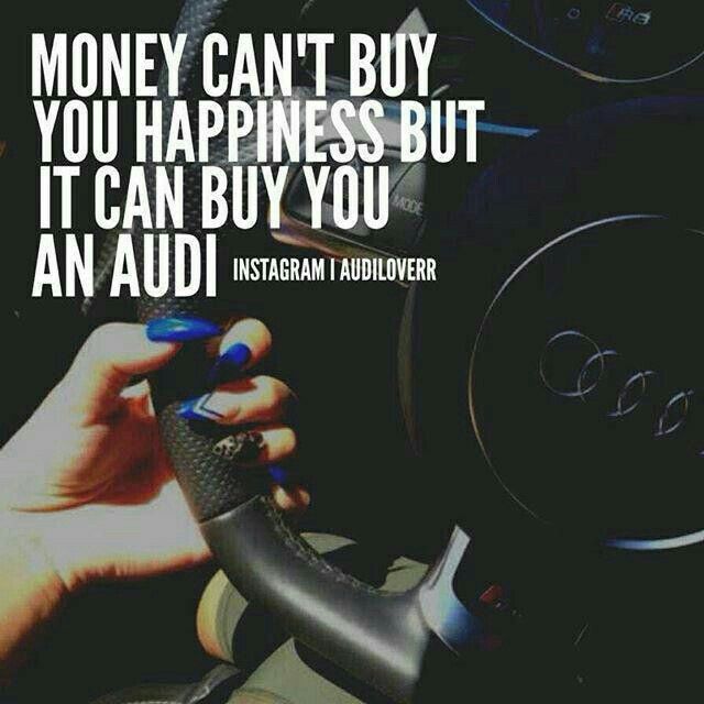 someone is holding the steering wheel in their hand and saying, money can't buy you happiness but it can buy you an audi