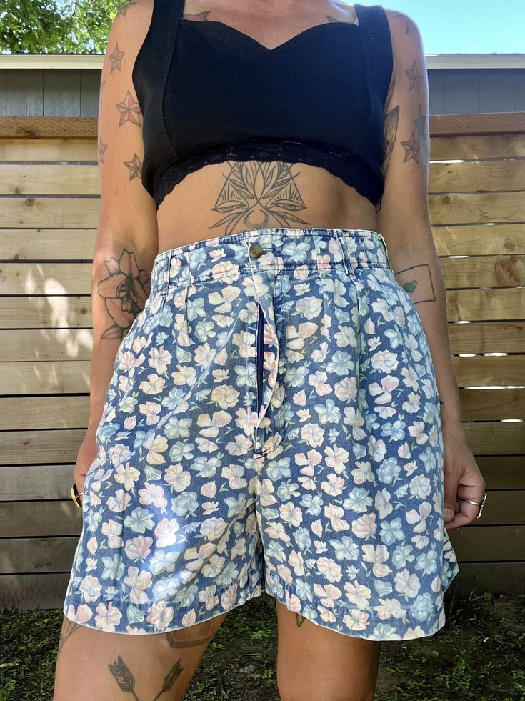 The cutest vintage 1990's floral shorts Faded coloring but still awesome  Side pockets  Zipper button fly  Great vintage condition minus the fading  Tag reads size 14  Measurements taken flat are  Waist: 15.5 in  Hips: 18 in  Rise: 14 in  Length: 18 in long  All sales are final  Thanks for checking out Cereal Vintage Thrift  Recycle Reuse Recreate  Recycle Reuse Recreate Vintage High-waisted Jean Shorts For Spring, Spring High-waisted Jean Shorts With Elastic Waistband, Floral Print Relaxed Fit Shorts, Floral Print Cotton Pajama Shorts, Cotton Floral Print Pajama Shorts, Relaxed Fit Floral Print Summer Shorts, Relaxed Fit Floral Print Shorts For Spring, Retro Shorts With Pockets For Spring, Summer Floral Print Relaxed Fit Shorts