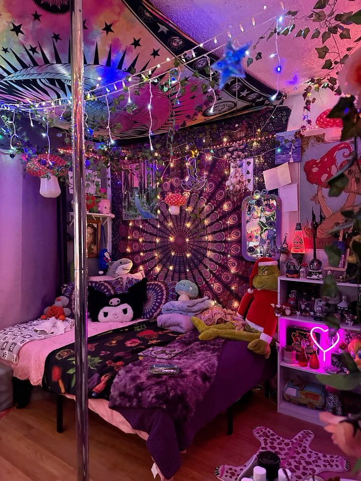 a bedroom with lights and decorations on the ceiling