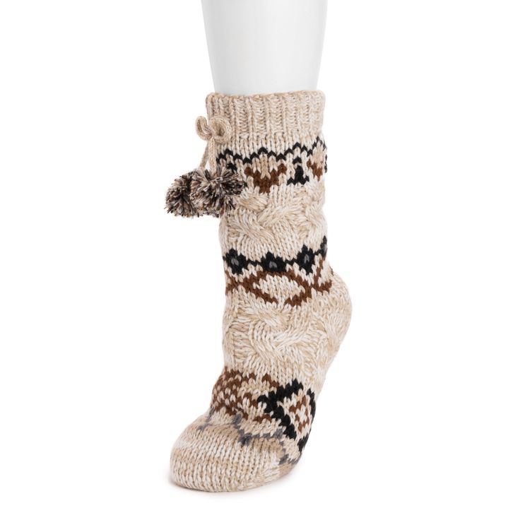 Prepare to kick your cozy game up a notch with MUK LUKS Chunky Cable Knit Cabin Socks. Fully lined with faux sherpa for that extra snuggle factor, these socks are like a warm hug for your feet. With playful pom details, beautiful sweater-knit designs, and stretchy knit that feels like a dream, you'll be dancing through your home in style. With multiple color options available you are sure to find the perfect pair! Machine wash cold on gentle cycle, no bleach, tumble dry low heat. Fully lined wit Cabin Socks, Summer Clearance Sale, Summer Sock, Chunky Cable Knit, Suede Slippers, Summer Slippers, Warm Hug, Beautiful Sweater, Slipper Socks