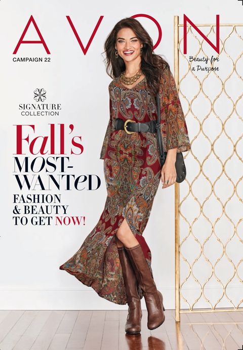 a woman in a long dress is standing on the cover of a magazine with her legs crossed