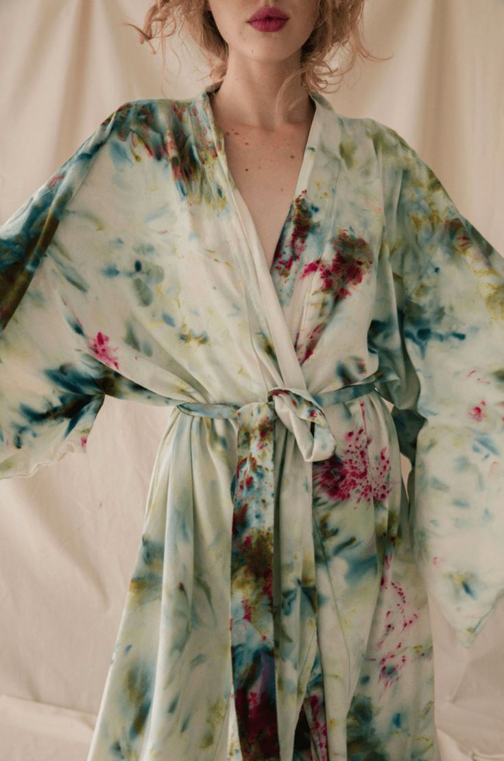 Rich auntie vibes activated. This lightweight and luxurious 100& raw silk kimono robe is fashioned in the spirit of a Japanese yukata or summer robe, perfect for lounging on a balcony or enjoying an evening in. Hand dyed in Upstate's studio, the robe is super soft thanks to its silk noil fabric, a material made from untreated silk reeled from the cocoon and covered with a protein called seracin that contains amino acids and collagen that absorb directly into the skin. Garden Party color way feat Spring Silk Wrap Robe, Spring Silk Kimono For Daywear, Silk Wrap Kimono For Daywear, Summer Long Sleeve Robe For Brunch, Long Sleeve Summer Robe For Brunch, Summer Long Sleeve Kimono For Daywear, Long Sleeve Summer Kimono For Daywear, Summer Silk Lounge Robe, Spring Silk Kimono For Loungewear