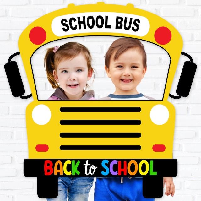 two children standing in front of a school bus with the words back to school on it