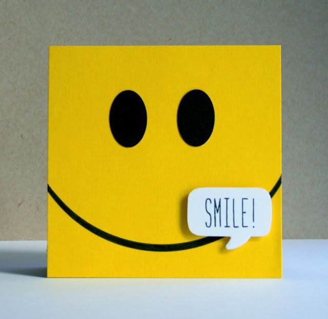 a yellow smiley face with a speech bubble attached to it's side that says smile