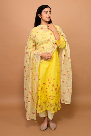 Yellow silk kurta with placed floral printed motifs highlighted by thread embroidery. Comes with contrast ivory pant and printed dupatta. - Aza Fashions Spring V-neck Palazzo Set, Yellow Salwar Kameez With Sheer Dupatta, Spring V-neck Sets With Dupatta, Fitted Kurta With Sheer Dupatta For Spring, Spring Fitted Kurta With Sheer Dupatta, Spring Traditional Palazzo Set, Fitted V-neck Dupatta, Kurta And Dupatta, Women Kurta