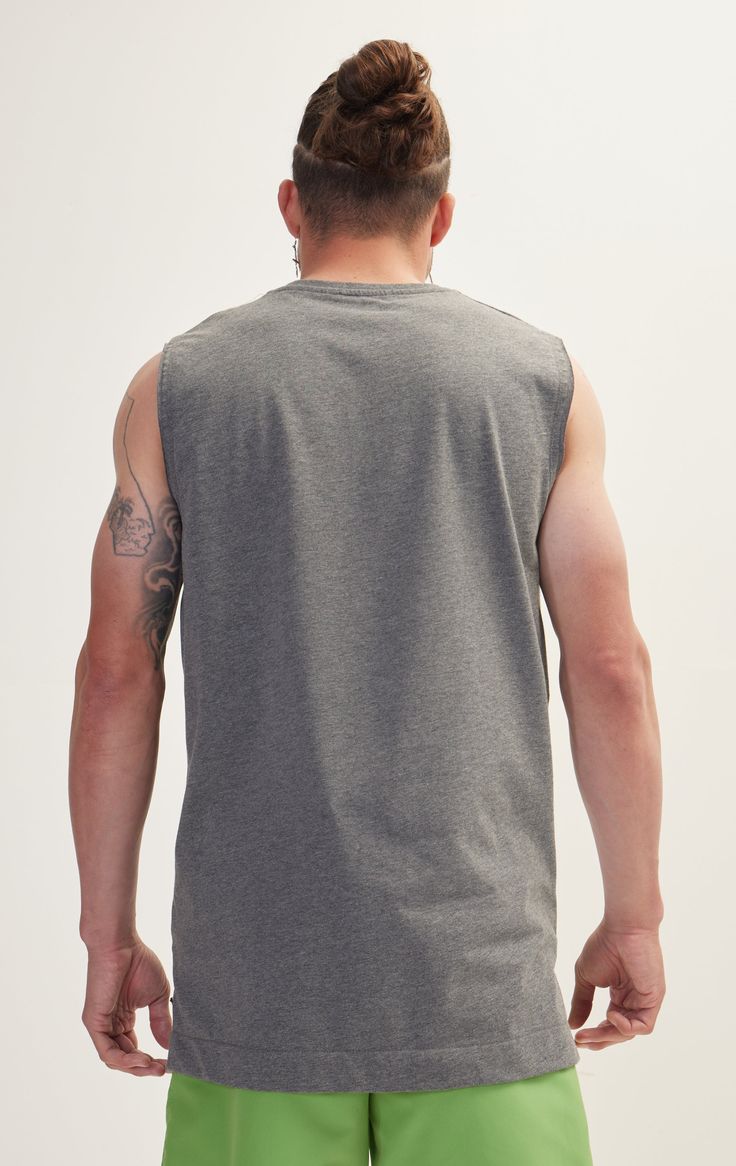 Elevate your summer wardrobe with our Men's Zero Sleeve Cotton T-Shirt. Crafted from soft, breathable cotton, this sleeveless tee is perfect for keeping cool on hot days. Its relaxed fit and classic crew neckline ensure comfort and versatility, making it ideal for everything from workouts to casual outings. Pair it with shorts or jeans for a laid-back look that doesn't compromise on style. SIZE + FIT Tailored fit, to find your correct size use the ''what's my size '' button. COMPOSITION 100% Cotton Made in Turkey CARE Machine wash cold with similar colors STYLE #: 8213 Athleisure Cotton Tank T-shirt, Cotton Tank T-shirt For Athleisure, Crew Neck Cotton Tank Top For Sports, Casual Cotton Stretch Muscle Tee, Basic Cotton Sports Top, Sporty Cotton Muscle Tee With Moisture-wicking, Sporty Moisture-wicking Cotton Muscle Tee, Moisture-wicking Cotton Tops For Workout, Moisture-wicking Cotton Workout Tops