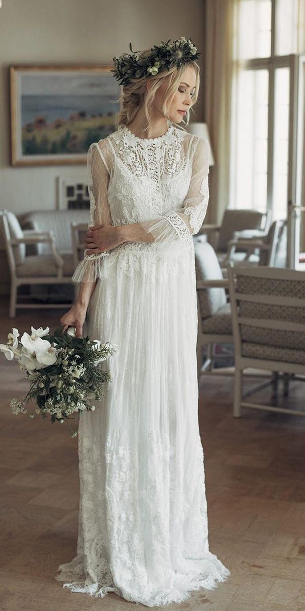 a woman in a wedding dress holding a bouquet