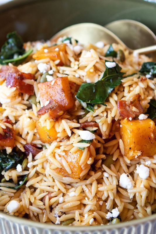 a bowl filled with rice, spinach and bacon