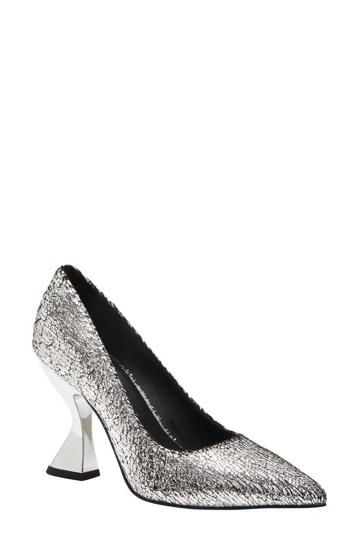 A sculptural metallic heel creates an artful aesthetic on a pointy-toe pump fitted with a cushioned footbed for lasting comfort. 3 1/2" heel Memory foam cushioning Synthetic upper and lining/rubber and synthetic sole Imported Silver Heels With Sculpted Heel For Gala, Luxury Metallic Pointed Toe Heels, Luxury Metallic Heels With Pointed Toe, Modern Party Heels With Sculpted Heel, Silver Almond Toe Heels With Sculpted Heel, Evening Closed Toe Court Shoes With Metal Feet, Evening Court Shoes With Metal Feet, Silver Heels With Sculpted Heel For Evening, Modern Metallic Heels With 4-inch Heel