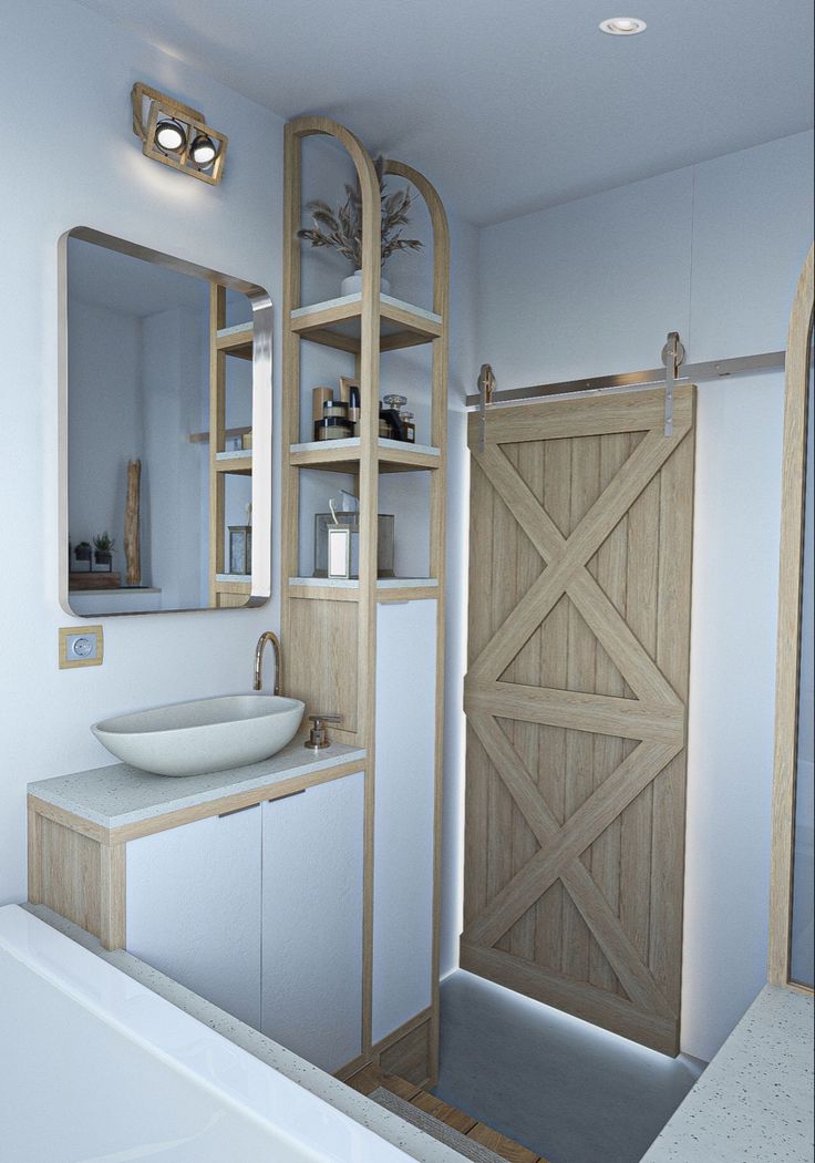 a bathroom with a sink, mirror and bathtub next to a large wooden door