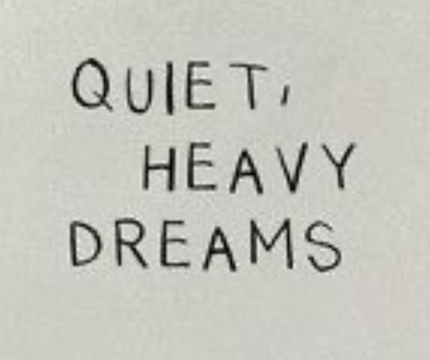 a piece of paper with writing on it that says quiet, heavy, heavy dreams