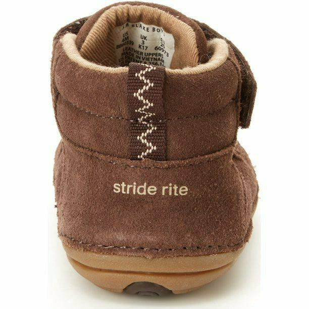 Classic brown leather and elasticized faux laces convey a spirit of adventure on these hook and loop booties. Baby boy's bootie with leather construction and hook and loop strap closure Memory foam footbeds Seamless construction that cradles the foot's natural shape Oversized opening for easy-on APMA approved Adjustable hook and loop closure with elastic faux laces Linings have got an agent that helps to fight microorganisms Flexible rounded soles to encourage natural movement and help improve b Natural Movement, Classic Brown, Natural Shapes, Hook And Loop, Bootie, Memory Foam, Baby Shoes, Brown Leather, Motion