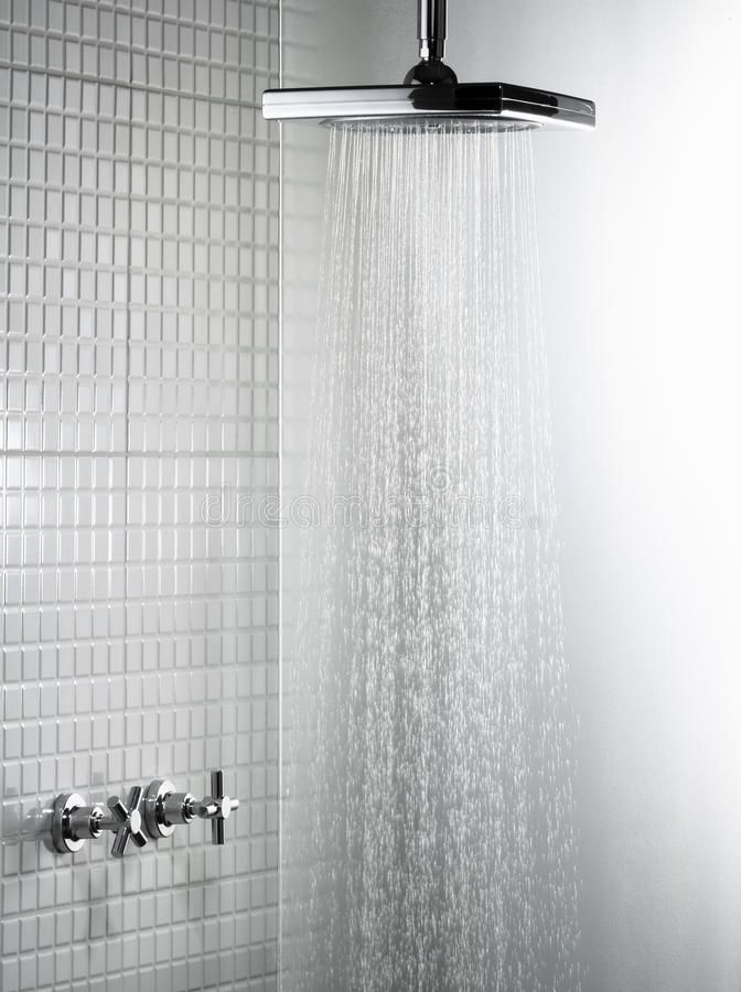 a shower head with water flowing from it