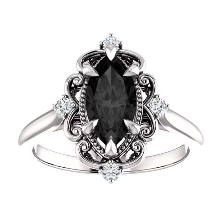 a black and white diamond ring on top of a white background with the center stone surrounded by diamonds