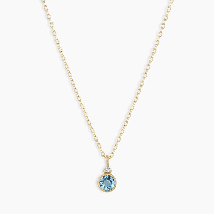 A modern heirloom. Introducing our take on a traditional style. Whether you wear yours or a loved one’s, a birthstone necklace is an easy way to add color and meaning to your look. This birthstone necklace features a 14k gold chain and diamond detail and makes for a perfect, personal gift. Blue Topaz is December's birthstone. Product Details Diamond: 0.01 total carat weight, 1.3 mm GH SI1-SI3 Blue Topaz: 0.15 total carat weight, 3 mm genuine blue topaz 14k solid gold 16" chain + 2" extender. Adj Color And Meaning, Gold Birthstone Necklace, December Birthstone Necklace, Gold Gemstone Necklace, Topaz Birthstone, Orange Agate, Yellow Opal, Blue Topaz Pendant, Gemstone Necklaces