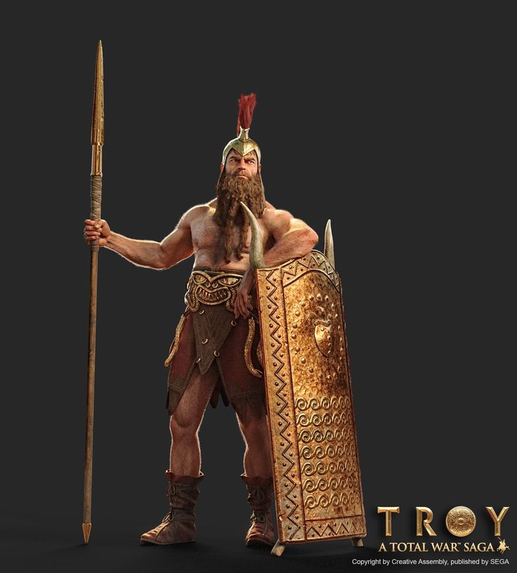 a man dressed in an ancient costume holding a spear and shield with the words troy written on it