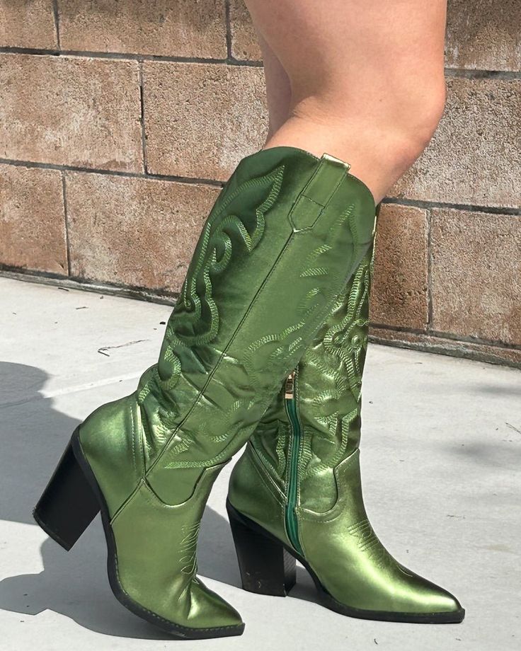 Stand out from the crowd with our Metallic Green Cowgirl Boots! These cute green western boots feature a 3.75" heel & intricate stitching that complements any outfit. Wear to your next concert, festival, rodeo or just because! Green Cowgirl Boots, Mini Tube Dress, Studded Denim, Concert Festival, Denim Corset, Corset Mini Dress, Denim Mini Dress, Halter Mini Dress, Black Sleeveless