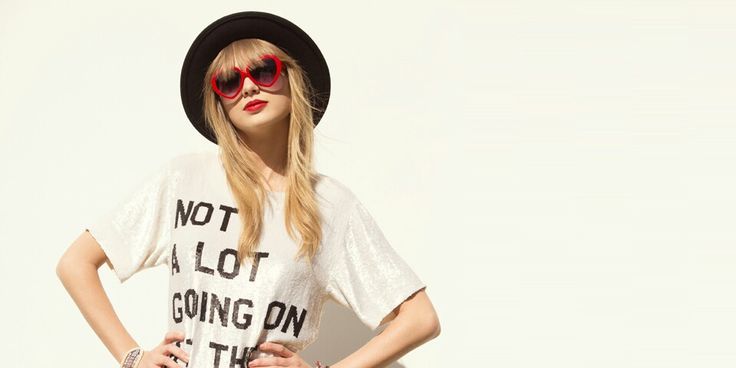 a woman wearing sunglasses and a t - shirt that says not a lot going on the moment