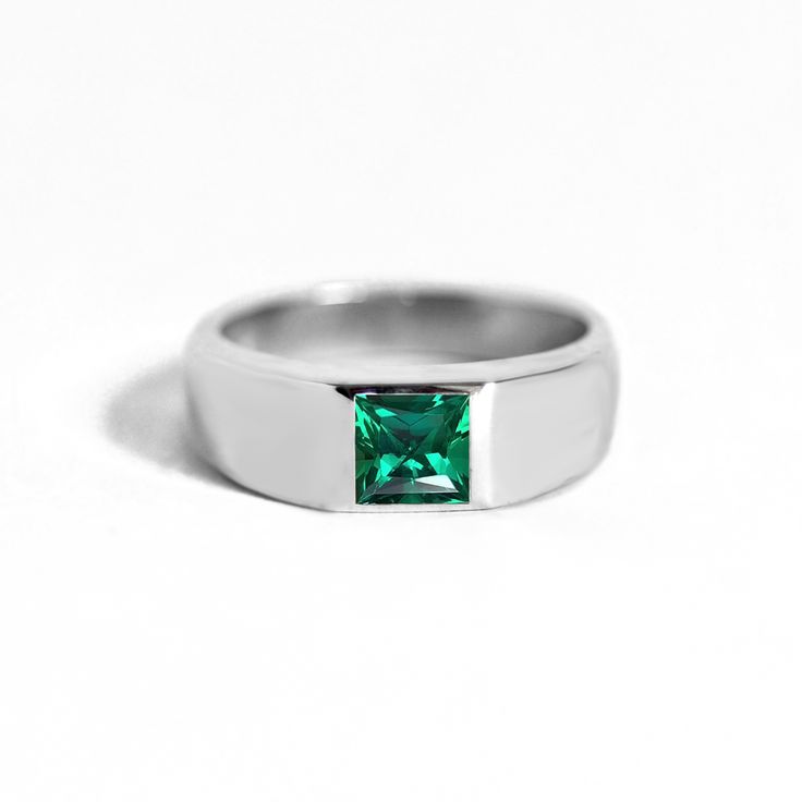 Item Details: Princess-cut emerald weighing approx. 0.65 ctw. This ring is 6.5 mm wide at the top and 3.75 mm wide at the base. Please note, we can set antique/heirloom diamonds in this setting. Set in your choice of platinum or 14K white, yellow, or rose gold. Please allow 10 days for production & delivery. Modern Brilliant Cut Emerald Promise Ring, Classic Square Cut Ring With Tension Setting, Modern Emerald Ring Vvs Clarity For Promise, Modern Emerald Promise Ring With Vvs Clarity, Modern Emerald Rings With Center Stone, Classic Emerald Princess Cut Diamond Ring, Classic Princess Cut Emerald Diamond Ring, Modern Asscher Cut Emerald Promise Ring, Promise Princess Cut Emerald Ring With Center Stone